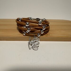 Love with paw print bracelet.